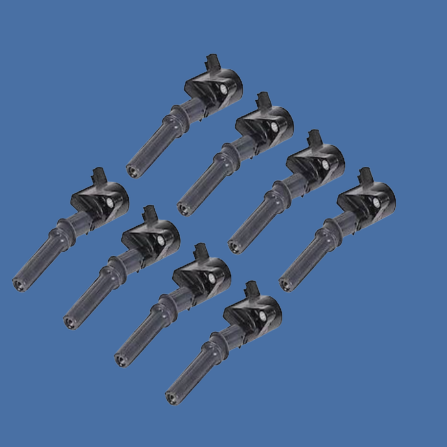 Set of eight black ignition coils on a white background