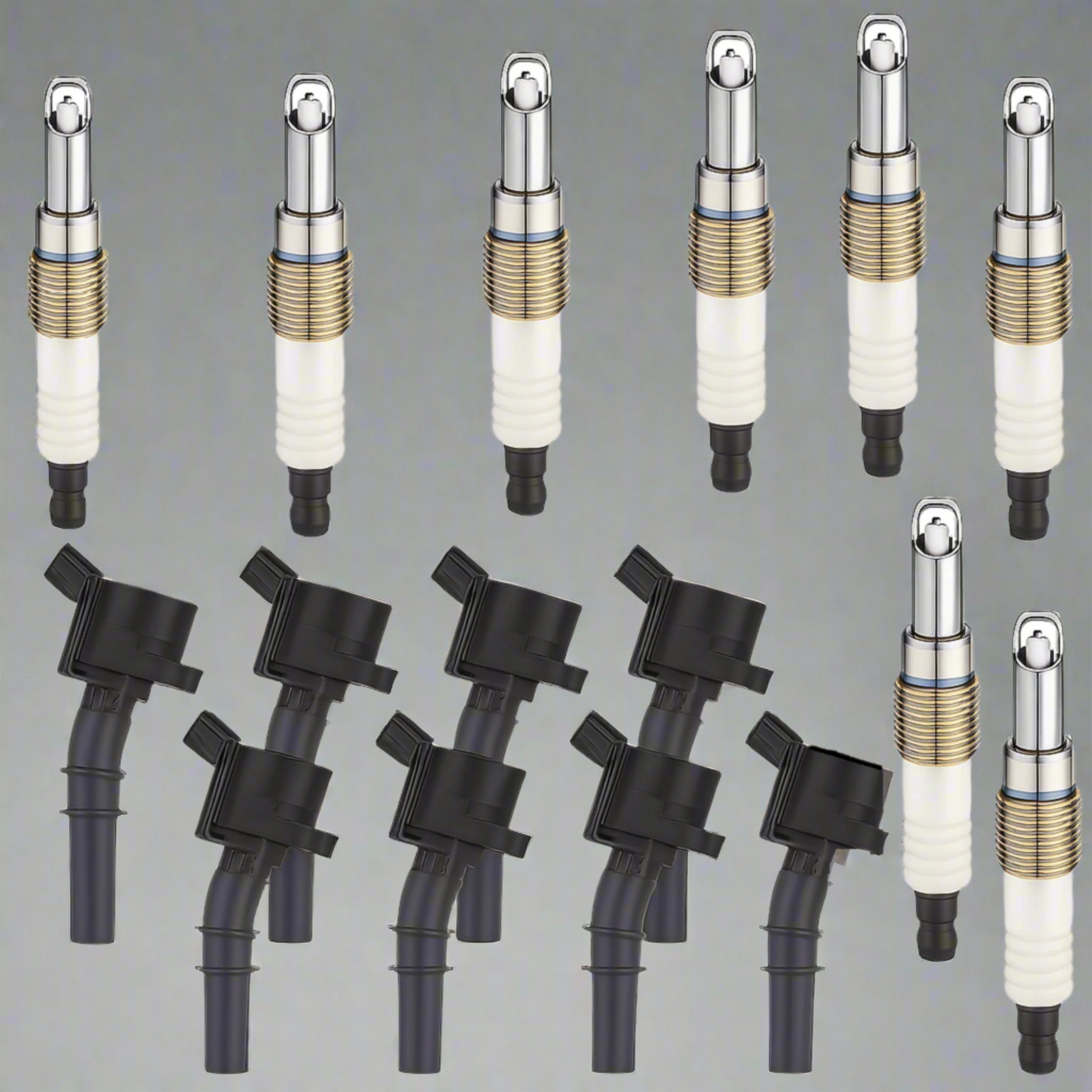 Set of spark plugs and ignition coils on a white background