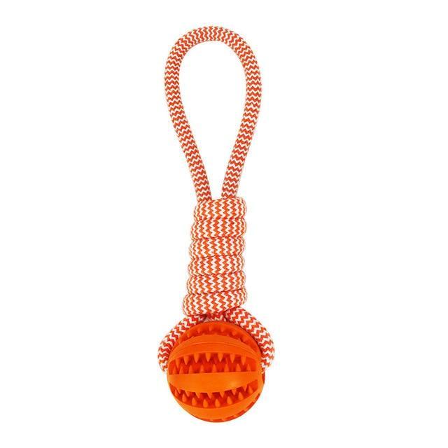 Orange dog toy with a rope handle on a white background